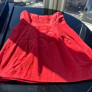 Sweetheart strapless dress with pockets in coral